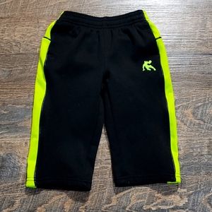 Gently Loved kids pants 12 months made by and one Neon green and black pockets